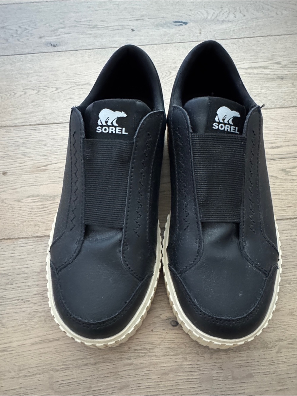 Sorel Black Slip-On Sneakers with Cream Soles